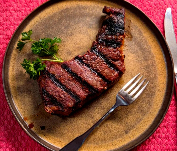 Steak A Meadow Mist New York strip steak, fresh off the grill.